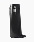 Shark Lock embellished glossed-leather knee boots